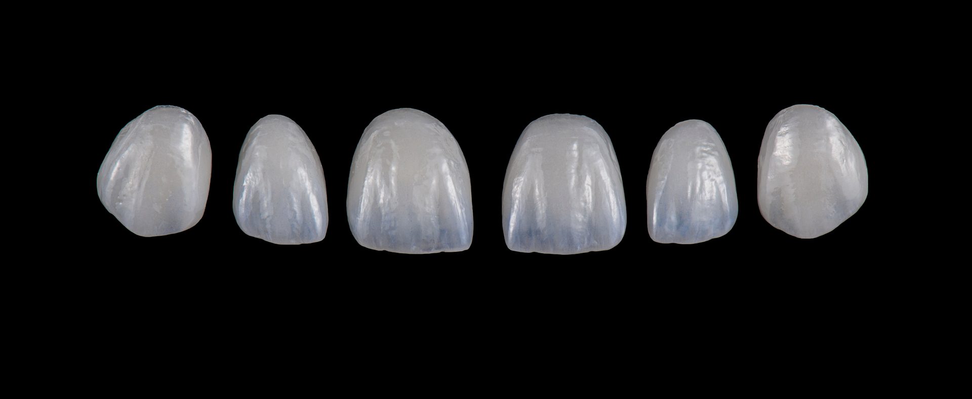 Rebuild a damaged tooth or fill a gap with a crown or bridge